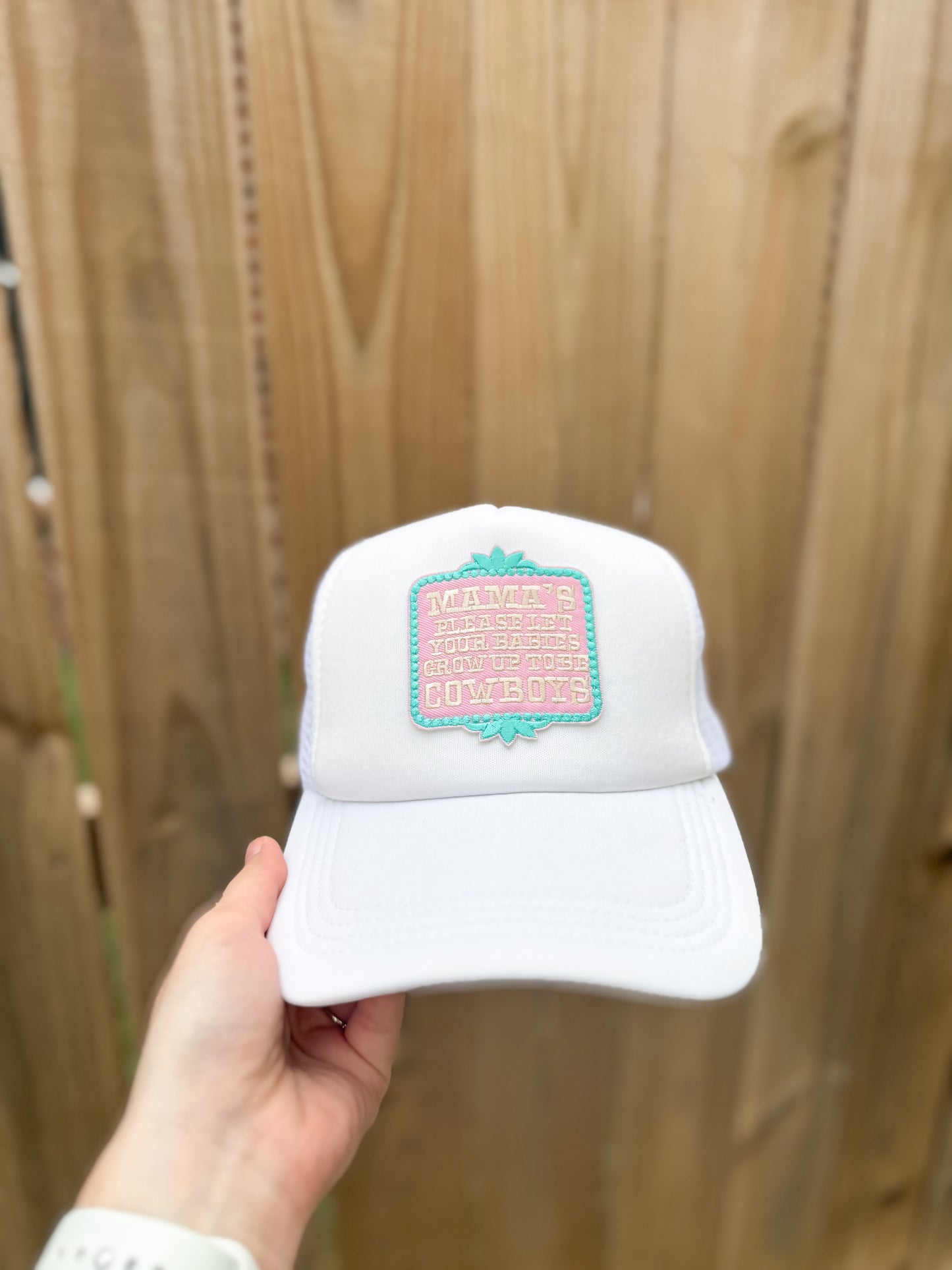 Mama’s Please Let Your Babies Grow Up To Be Cowboys Trucker Hat